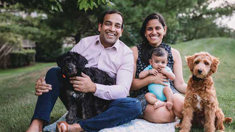 Dr. Joshi family with therapy dogs Joshi family after child had tongue tie release