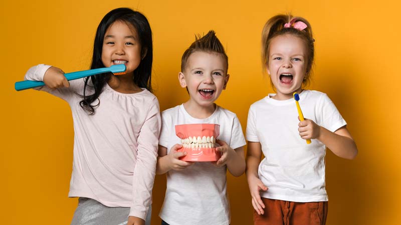 Kids laughing at pediatric laser dentist