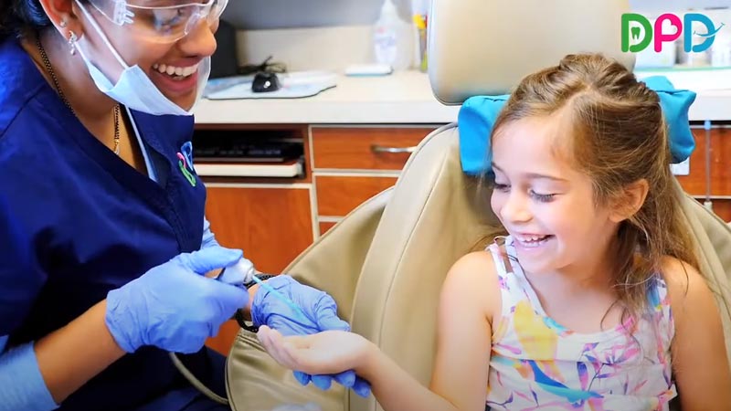 Wheaton Children's Dentist Having Fun with Patient