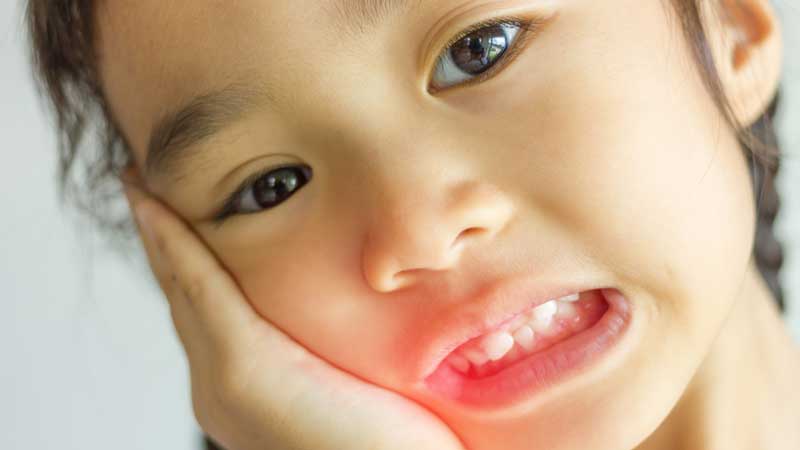 Child Holding Mouth From Toothache Child Holding Mouth From Toothache